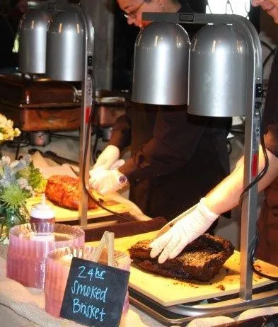 Chef-attended meat carving station at a catered event