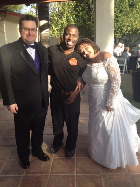 The BBQ Daddy with bride and groom at Phoenix backyard wedding