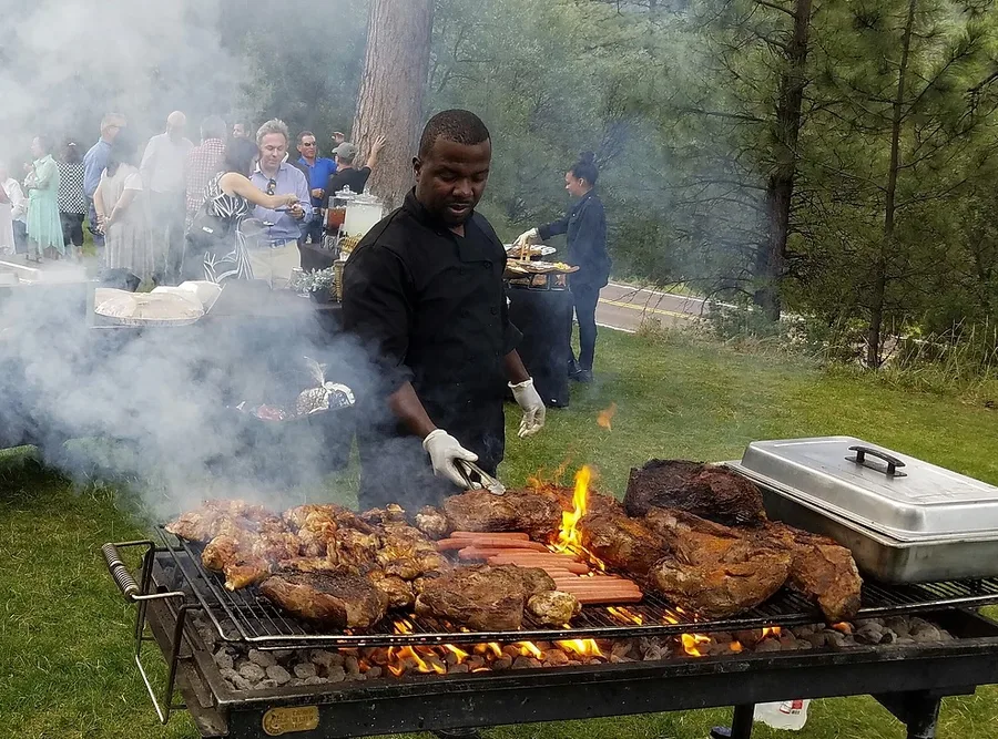 Chef Terry Matthews grilling onsite at a San Diego catering event