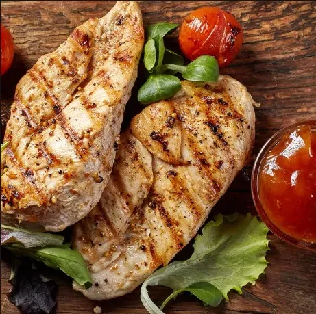 Grilled chicken breast with char marks