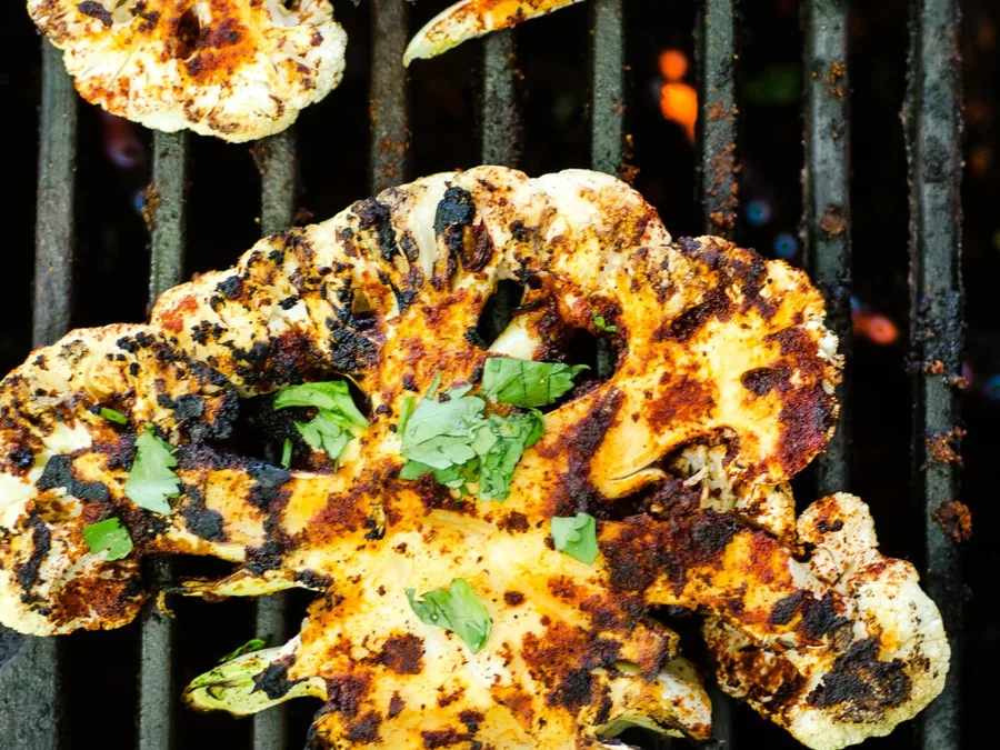 Grilled cauliflower steaks with char