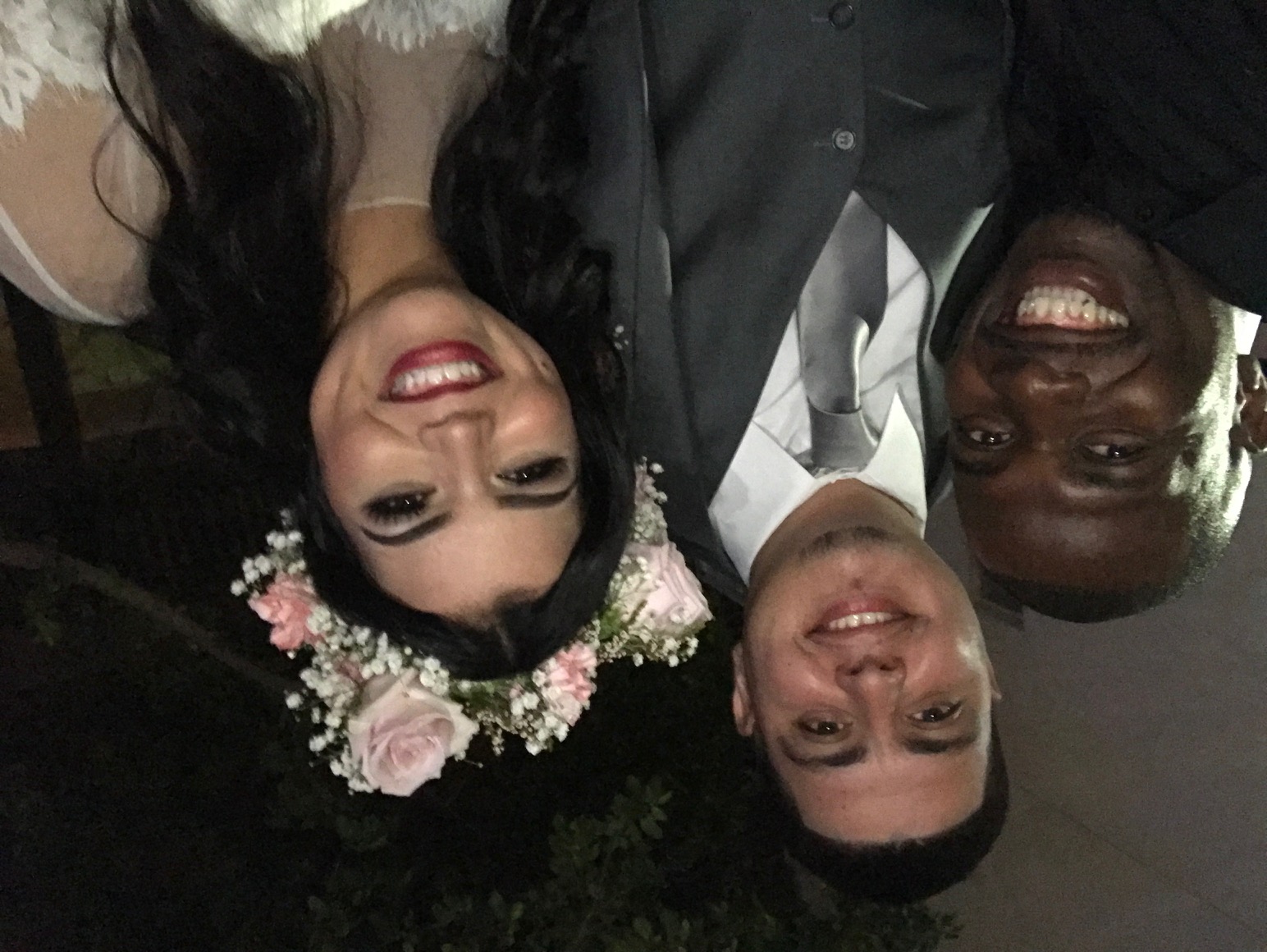 Chef Terry selfie with bride wearing floral crown and groom at a San Diego County wedding
