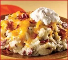 Loaded red mashed potatoes with bacon and cheese
