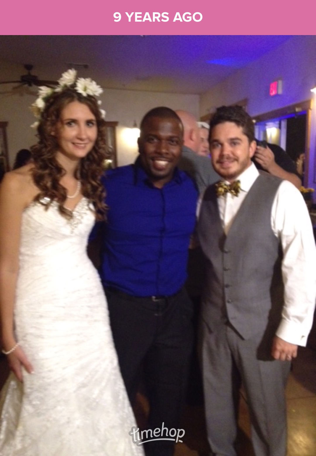 The BBQ Daddy with bride wearing floral crown and groom in bow tie at a Phoenix wedding reception