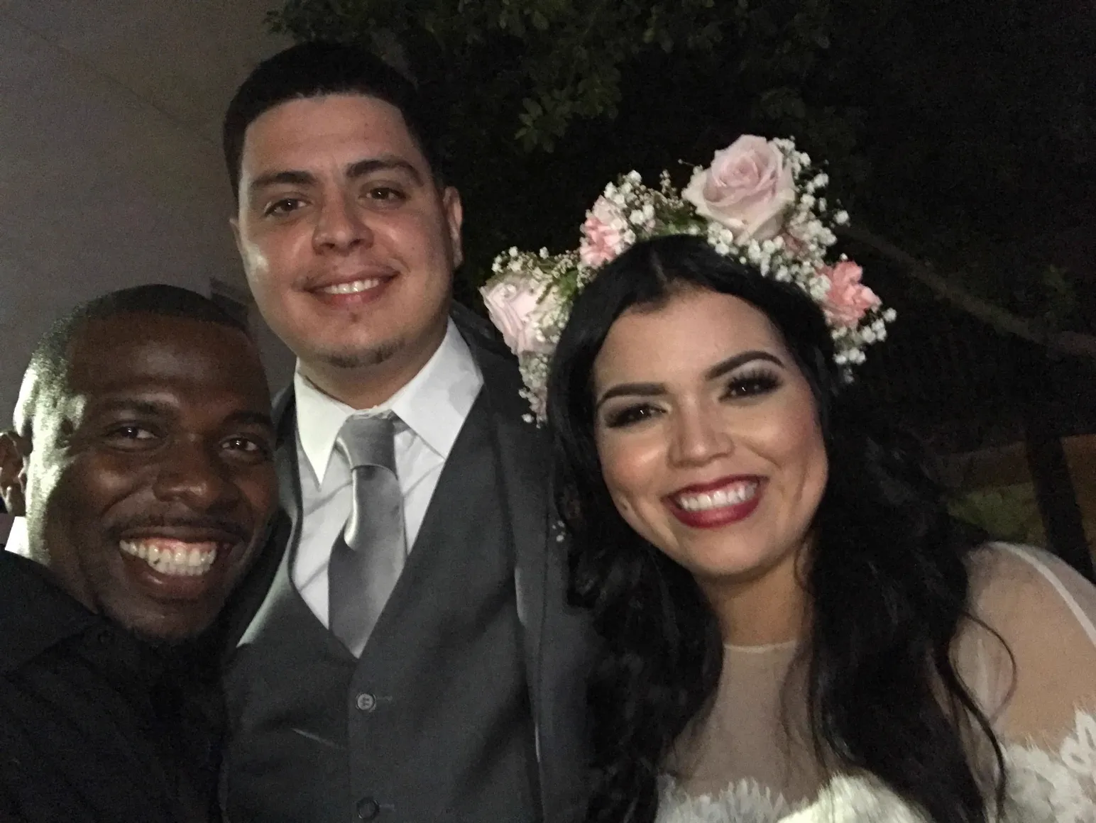 Chef Terry selfie with bride wearing floral crown and groom at a San Diego County wedding