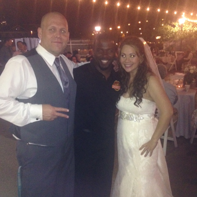 Chef Terry celebrating with bride and groom at outdoor Phoenix wedding