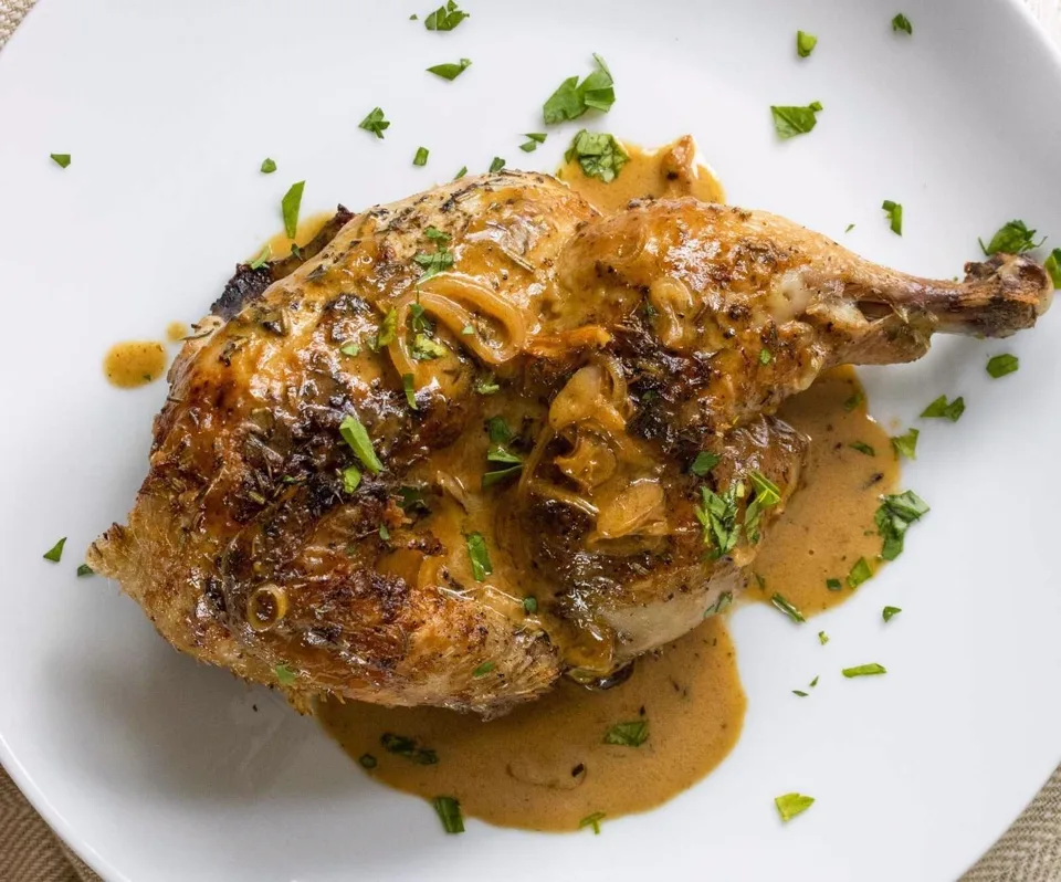 Cornish game hens with wild mushroom and herb gravy